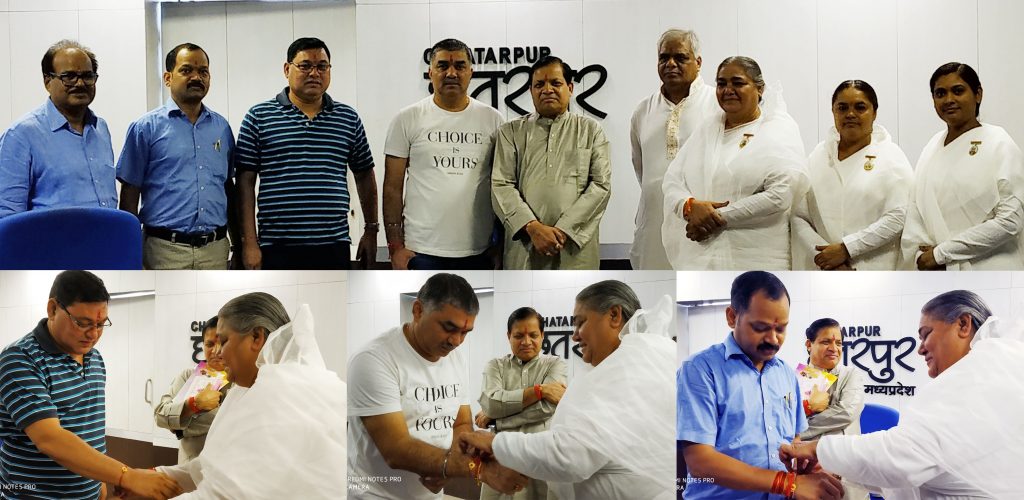 BK Shailja tying Rakhi to Collector Mr. Ramesh Bhandari, ADM Mr. D.K. Mourya, SP Mr. Vineet Khanna and ASP Mr. Jairaj Kuber in collectorate.
