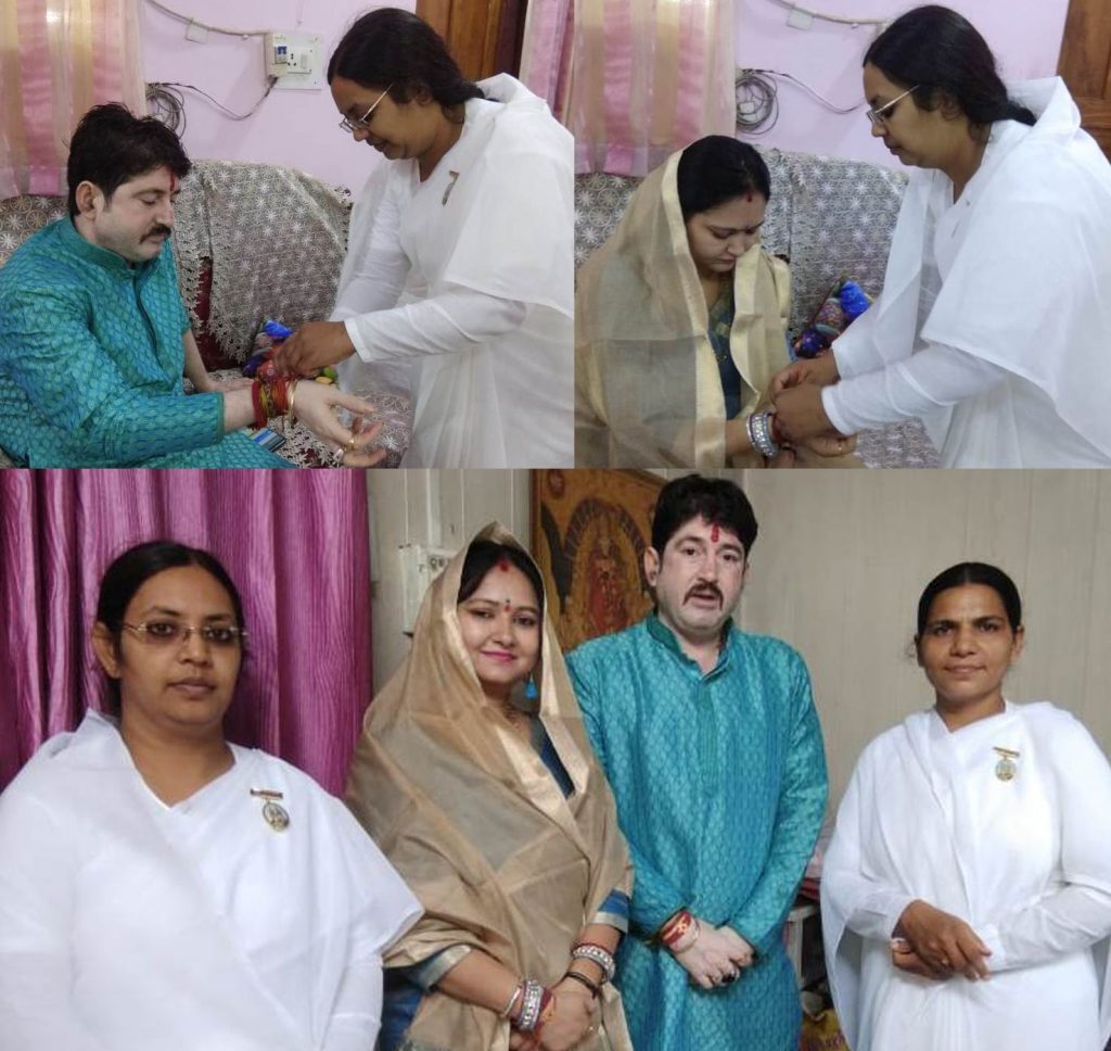 BK Monika tying Rakhi to BJP Zila Adhyaksh Pushpendra Pratap Singh and Nagar Palika Adhyaksha Archana Singh